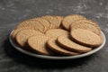 Plate of arrowroot biscuits on a rustic background. Royalty Free Stock Photo