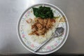 a portion of tender, crispy Chinese pork belly served with a side of steamed rice