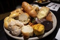 plate of assorted breads and rolls, each unique in its own way Royalty Free Stock Photo