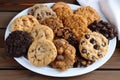 plate of assorted cookies, including chocolate chip, oatmeal raisin and peanut butter