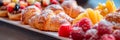 plate of assorted pastries, showcasing a variety of flaky croissants, fruit tarts, and cream puffs in vibrant detail