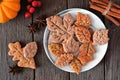Plate of autumn leaf cookie table scene over rustic wood Royalty Free Stock Photo