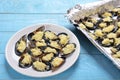 Plate with baked mussels with cheese and onions Royalty Free Stock Photo