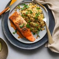 A plate of baked salmon with a side of quinoa pilaf2, Generative AI