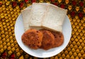 A Plate of Bean Pancakes or Nigerian Akara and sliced bread Royalty Free Stock Photo