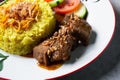 plate of beef rendang, Indonesian food