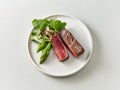 Plate of beef wagyu steak meat with herbs and asparagus Royalty Free Stock Photo
