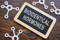 Plate Bioidentical hormones and chemical models from plastic. Royalty Free Stock Photo