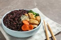 Plate of boiled brown rice with meat served on table, closeup Royalty Free Stock Photo