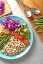 Plate with boiled rice, vegetables and meat on grey background Royalty Free Stock Photo