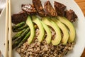 Plate with boiled rice, vegetables and meat on table, closeup Royalty Free Stock Photo