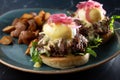 plate of braised beef eggs Benedict Royalty Free Stock Photo