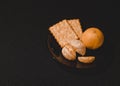 A plate of breakfast on a dark background