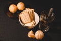 A plate of breakfast on a dark background