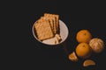 A plate of breakfast on a dark background