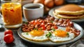 Plate of Breakfast Food With Eggs, Bacon, and Pancakes Royalty Free Stock Photo