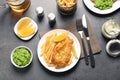 Plate with British traditional fish and potato chips Royalty Free Stock Photo