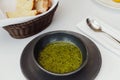 Plate of broccoli and green peas cream soup with bread toast isolated on white background top view Royalty Free Stock Photo