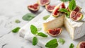 Plate with camembert, fig fruits and fresh basil on a white background Royalty Free Stock Photo