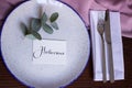 Plate with card signed name of bride on beautiful designed paper