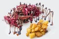 Carved roast-beef portion with radicchio and baked potatoes Royalty Free Stock Photo