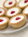 Plate of Cherry Bakewell Tarts Royalty Free Stock Photo