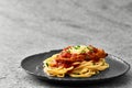 Plate chicken parmigiana and spaghetti on a gray stone background. Copy space. Low angle view Royalty Free Stock Photo
