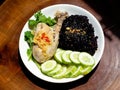 A plate of chicken rice with brown rice and vegetables Royalty Free Stock Photo