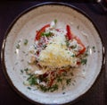 Plate with with chicken, vegetables and grated cheese close up Royalty Free Stock Photo