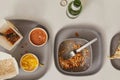 A plate of Chinese food and a drink on the table. Flat lay, top view.