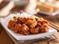 Plate of chinese general tsos chicken with rice and broccoli Royalty Free Stock Photo