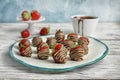 Plate with chocolate covered strawberrie Royalty Free Stock Photo