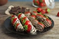 Plate with chocolate covered strawberries Royalty Free Stock Photo