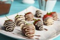 Plate with chocolate covered strawberries Royalty Free Stock Photo