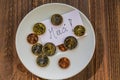 Plate with coins Royalty Free Stock Photo