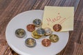 Plate with coins Royalty Free Stock Photo