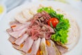 A plate of cold cuts. Meat delicacies for buffets. Royalty Free Stock Photo