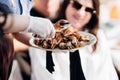 plate with Cooked seafood on a barbecue grill. Grilled shrimp. Royalty Free Stock Photo