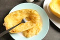 Plate with cooked spaghetti squash and fork Royalty Free Stock Photo