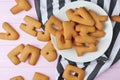 Plate with cookie letters on napkin Royalty Free Stock Photo