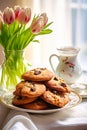 Plate of Cookies and Vase of Tulips Royalty Free Stock Photo