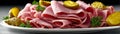 Plate of corned beef slices with pickles, deli meat, appetizer Royalty Free Stock Photo