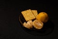 A plate of breakfast on a dark background