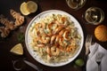 A plate of creamy fettuccine Alfredo with grilled shrimp and Parmesan cheese Royalty Free Stock Photo