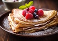 Plate with crepe pancakes with raspberry and blueberry on wooden table.Macro.AI Generative Royalty Free Stock Photo