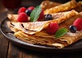 Plate with crepe pancakes with raspberry and blueberry on wooden table.Macro.AI Generative Royalty Free Stock Photo