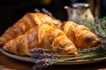 Plate with croissants and a bunch of lavender