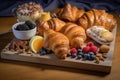 plate of croissants, with variety of pastries and confections for the eyes and tastebuds