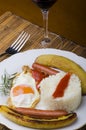 Plate with Cuban rice with bananas and tomato sauce Royalty Free Stock Photo