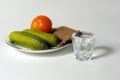 Plate with cucumbers and tomato Royalty Free Stock Photo